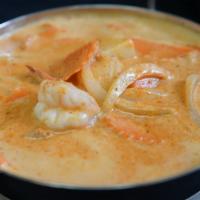 Massaman Curry · Medium. carrots, potatoes, onion, and peanuts in massaman curry paste and coconut milk with ...
