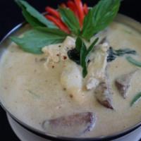 Green Curry · Medium. peas, eggplant, bamboo shoot, fresh basil, and bell peppers in green curry paste and...