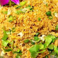 Crab Fried Rice · Thai Style Fried Rice with Lump Crab, tomato, Celery And white And Green Onions