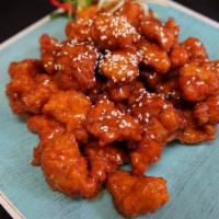 Sesame Chicken · Deep-fried battered chicken tossed in sweet
sesame sauce and topped with sesame seed.