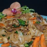 Pad See Ew · wide rice noodle with egg, Chinese broccoli, and carrots stir-fried in sweet soy sauce with ...