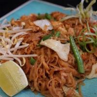Pad Thai Sukhothai · Stir-fried rice noodles with egg, tofu, bean sprouts, green onions, dried shrimp, radish pic...