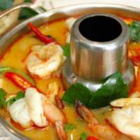 Tom Yum · Choice of chicken or shrimp in hot and sour soup with lemongrass, lime leaves, tomato, and s...