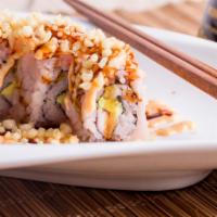Crunch Roll · Cooked. Shrimp, crab, avocado, and topped with spicy crab and crunch.