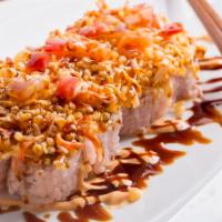 Hot Mama Roll · California roll topped with salmon, snapper, tuna, shrimp, crab, and crunch.