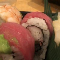 Rainbow Roll · Crabmeat avocado, cucumber inside, topped with tuna ,salmon shrimp, avocado.