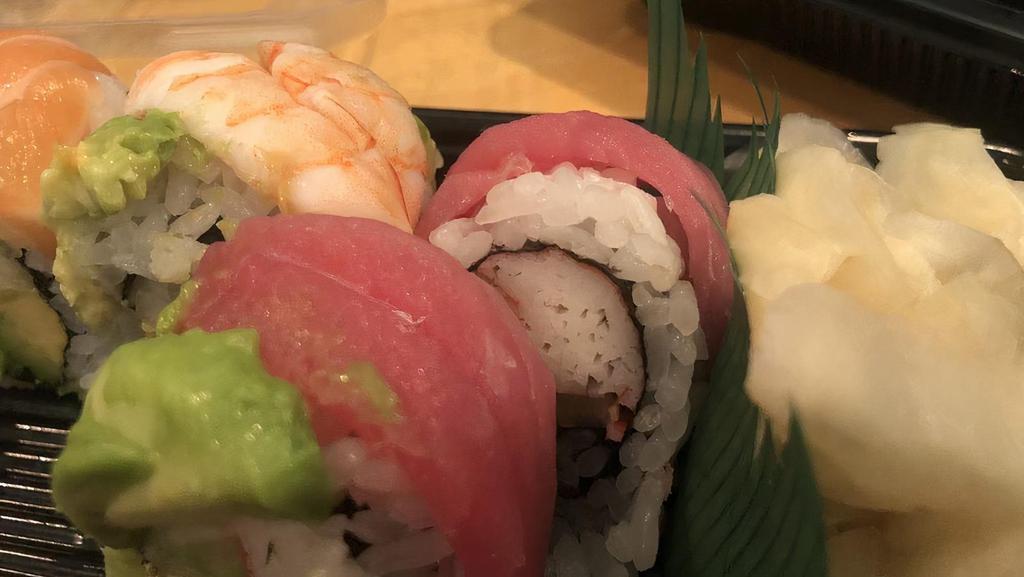 Rainbow Roll · Crabmeat avocado, cucumber inside, topped with tuna ,salmon shrimp, avocado.