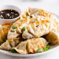 Chicken Dumpling · Yummy pan-fried dumplings stuffed with chicken and seasonings.