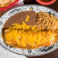 Burrito Enchilada · Burrito ground beef topped with chili gravy and cheese served with , rice, refried beans.
