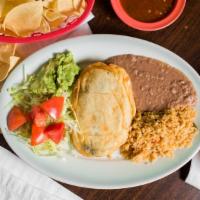 Chile Relleno · Poblano paper filled with Mexican White cheese, guacamole salad, rice, refried beans, tortil...
