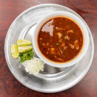 Menudo · traditional Mexican soup, made with cow's stomach in broth with a red chili pepper base. Hom...