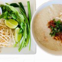Cambo Rice Soup (Porridge, Ba Baw) · Large. Serve with fresh herbs, bean sprouts, lime, salted soy beans, fried garlic, fried oni...