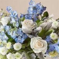 Clear Skies Bouquet · A fresh bouquet of cremes & hues in blues designed in a 6