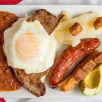 Bandeja Guajira · Includes steam rice, red beans, beef steak, pork rinds, fried egg, boiled yucca and Spanish ...
