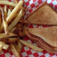 Grilled Cheese · Served with American cheese on Texas toast with Fries & a Drink
