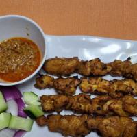 Chicken Satay (4 Skewers) · Marinated chicken with Malaysia spices grilled to perfection.