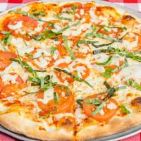 Margarita Pizza · Homemade Pizza Sauce, Extra Virgin Oliive Oil, Fresh tomatoes, fresh Basil, fresh Garlic, Pa...