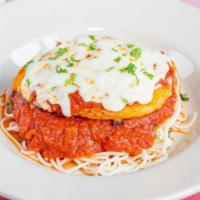 Chicken Parmigiana · Breaded chicken sauteed with tomato sauce topped with Parmesan & mozzarella cheese.