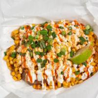 Elote ''Mexican Street Corn'' · Grilled corn, mayo, sour cream, lemon pepper, cojita cheese, chives, and Valentina hot sauce.