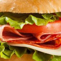 Italian · Ham, salami, lettuce tomatoes, onions, mayo, sauce (is a mixture of mayo, olive oil, vinegar...