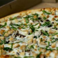 Spinach Chicken Alfredo Pizza · Cream alfredo sauce, chicken, mushrooms, spinach, fresh basil, and mozzarella cheese.