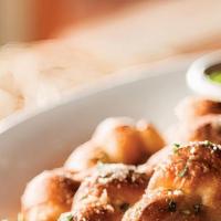 Homemade Garlic Knots · Hand-knotted pizza dough tossed with sicilian extra virgin olive oil, fresh garlic and pecor...