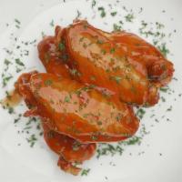 Wings · Let’s get into these Mouth watering  Wings! Get them smothered in your favorite sauce!