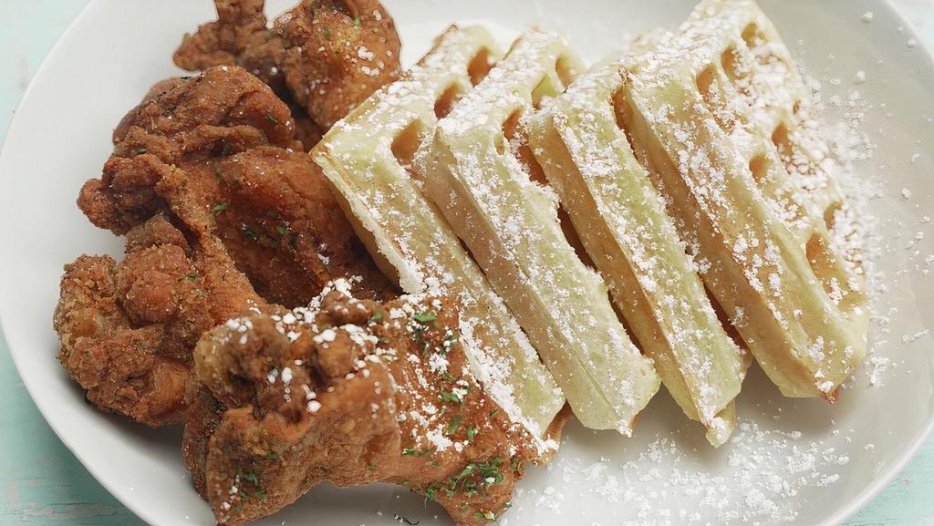 “ Chiccen Hawk” ( Chicken And Waffles) · Delicious deep fried  chicken (4 pieces) served with a buttermilk waffle served with powdered sugar and maple syrup