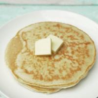 Buttermilk Pillowcakes · 2 buttermilk pancakes as soft as your pillow served with butter and maple syrup