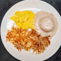 Biscuits & Sausage Gravy · Homemade sausage gravy loaded over flakey biscuits. Served with hash browns