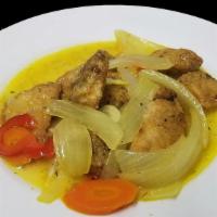 Escovitch Tilapia · Pieces of tilapia fillet fried and marinated in onions, peppers Scotch Bonnet peppers, and J...
