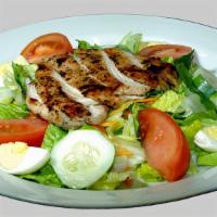 Chicken Salad · Choice of a fried or grilled chicken breast over crisp romaine lettuce with tomato cucumber ...