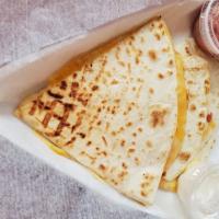 Cheese Quesadilla · Served with salsa, chips and chipotle sauce