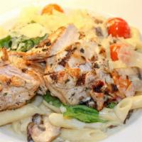 Penne Pasta · Olive oil, mushrooms, spinach, tomato, garlic, Parmesan and basil cream sauce.