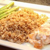 Broiled Chilean Salmon · Served with brown rice, grilled asparagus and a lemon cream sauce.