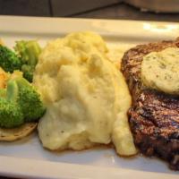 Ribeye · Gluten-free. Twelve oz. ribeye. Housemade seasoning rub, chargrilled your way. Topped with a...