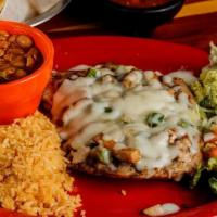 Pechuga Monterrey · Grilled chicken breast topped with onions, bell peppers, mushrooms and melted mozzarella che...