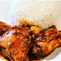 Pollo Guisado · Chicken stew.