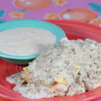Biscuit, Eggs & Gravy · Split biscuit topped with scrambled eggs and
our own chicken sausage gravy, served with crea...