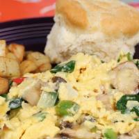Garden Fresh Veggie Scramble · Three eggs scrambled with onions, red and green peppers, spinach, mushrooms and white chedda...