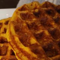 Cachaffle · Mékato's take on the Venezuelan classic cachapa. Sweet corn waffle served with cheese and sa...