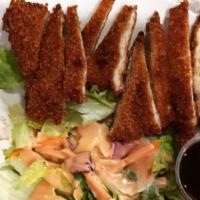 Tonkatsu · Tender pork loin topped with Japanese bread crumbs.