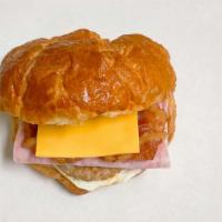 Ham, Bacon, Sausage Egg And Cheese · 3 Meats: Ham (2 slices), Bacon (2 strips), Sausage ( 1 patty), Egg and Cheese