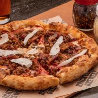 The Carnivore Pizza · Sausage, Canadian bacon, ground beef, pepperoni, sweet peppered bacon, red sauce, mozzarella.