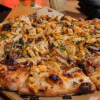 Bbq Chicken Pizza · Pulled roasted chicken, onions, cilantro, diced jalapeños, cheddar, sweet peppered bacon, BB...
