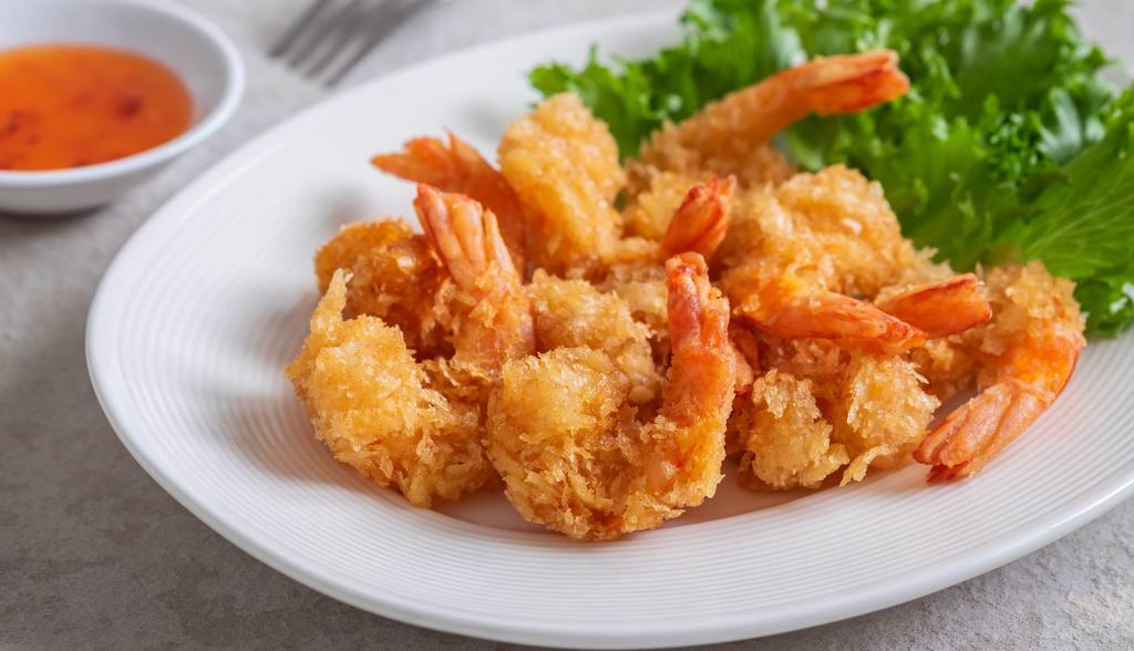 Fried Shrimp · Buttermilk battered jumbo fried shrimp served with fries and bread & butter pickle slaw.