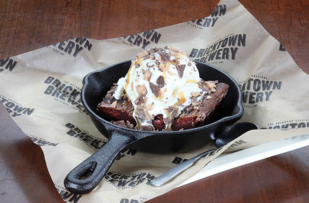 Heath Bar Crunch® Brownie · Warm brownie served with scoop of Tillamook®
vanilla bean ice cream topped with caramel sauce
and Heath Bar Crunch® bits.