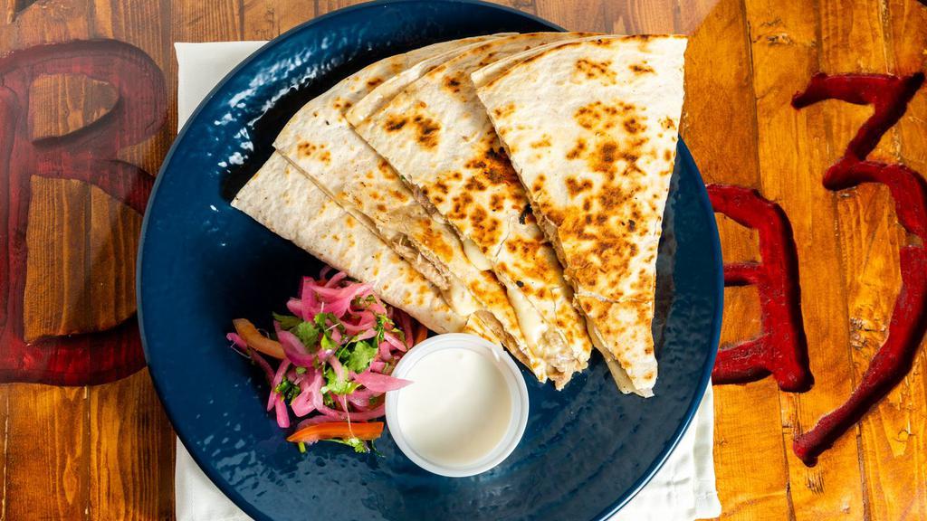 King Size Quesadilla · Jack cheese, garlic cream and pico de gallo with your choice of pulled pork, pulled chicken, ground beef, or veggie fajita