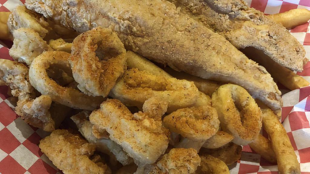 Half Catfish & Shrimp Basket · Comes with Cajun Fries.
