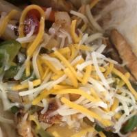 Highland · Chicken fajita with grilled onions and peppers, topped with mixed cheese, served on a flour ...